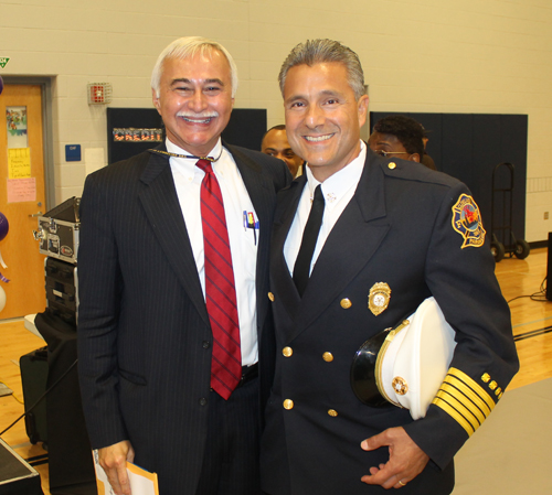 Jose Feliciano and Cleveland Fire Chief Angelo Calvillo