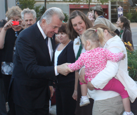 Hungarian President Pl Schmitt meets a baby