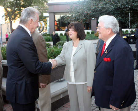 President Pl Schmitt  greets Marika and John Megyimori