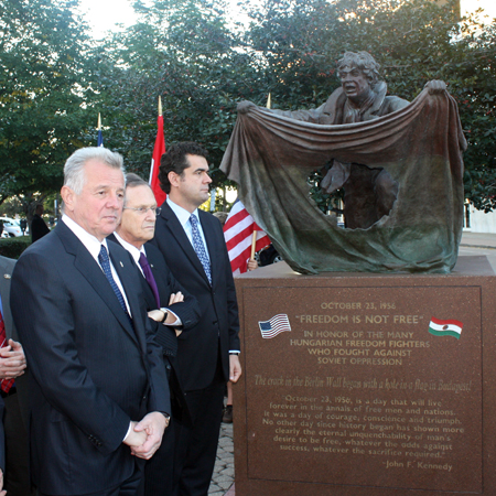 Hungarian President Pl Schmitt in front of the Freedom Fighter statue in Cleveland Ohio