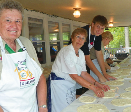 Clara Thurmer, Orsolya Sedenszky and Miklos Toth making langos