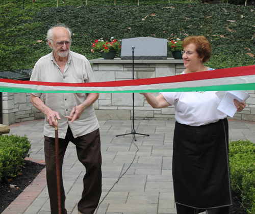 Ernie Mihaly and Carolyn Balogh cut the ribbon in the Hungarain Cultural Garden in Cleveland