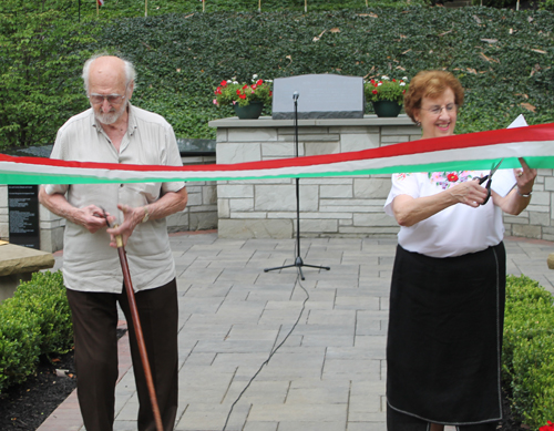 Ernie Mihaly and Carolyn Balogh cut the ribbon in the Hungarain Cultural Garden in Cleveland