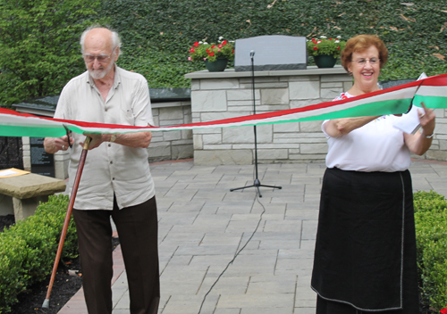 Ernie Mihaly and Carolyn Balogh cut the ribbon in the Hungarain Cultural Garden in Cleveland