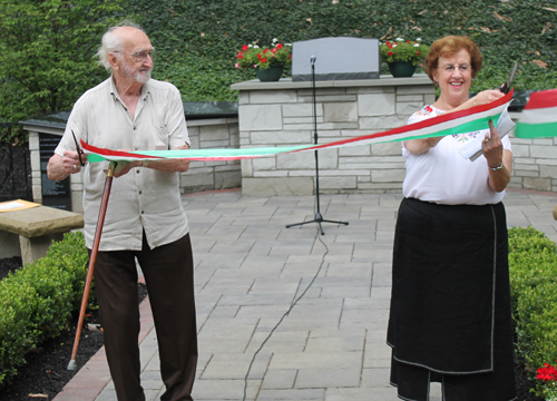 Ernie Mihaly and Carolyn Balogh cut the ribbon in the Hungarain Cultural Garden in Cleveland