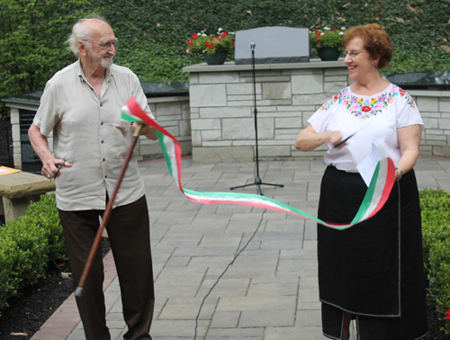 Ernie Mihaly and Carolyn Balogh cut the ribbon in the Hungarain Cultural Garden in Cleveland