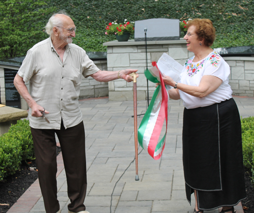 Ernie Mihaly and Carolyn Balogh cut the ribbon in the Hungarain Cultural Garden in Cleveland