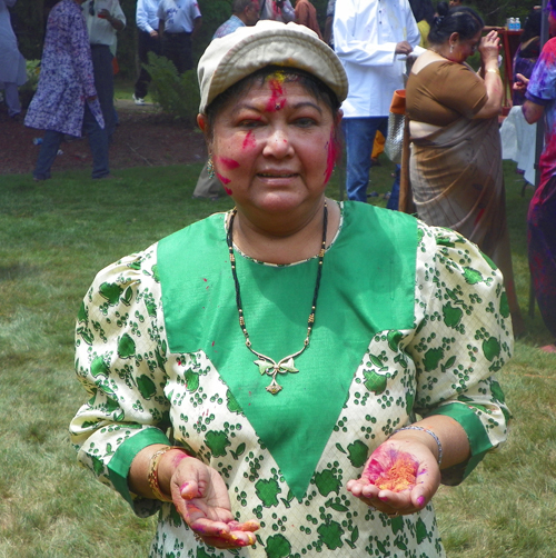 People covered in Holi colors