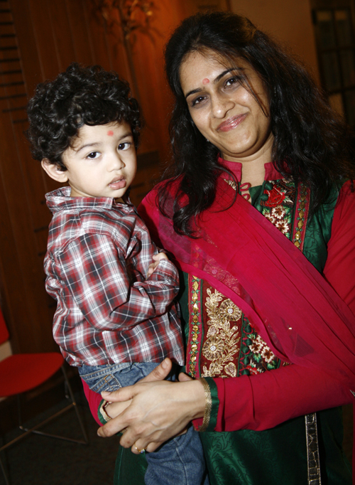 Mother and son at FICA Holi celebration in Cleveland