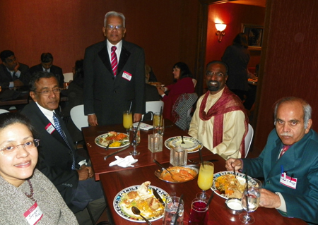 Group at table for Minister's visit