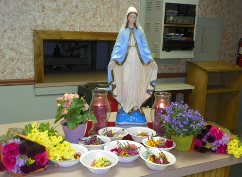 Statue of Blessed Virgin Mary - after flowers