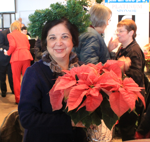 Mona Alag with a poinsettia