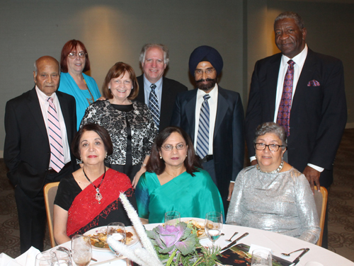 (standing) Harjit Alag, Debbie Hanson, Sheila and Bob Crawford, Hardip Singh and Lonnie Coleman, (seated) Mona Alag, Sarvans Singh and Fran Coleman