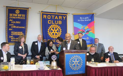 Ramesh Shah and AIPNO doctors give pins to Cleveland Rotary