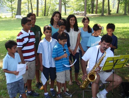 Indian-American children signing the national anthems of the US and India