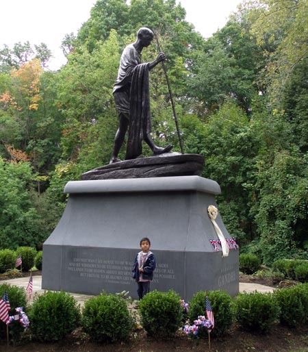 Child in front of the Mahtama Gandhi statue in Cleveland Indian Cultural Gardens