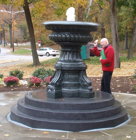 Father Jim O'Donnell blesses the fountain
