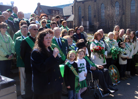 Kathleen Cooper sings the Irish and US anthems