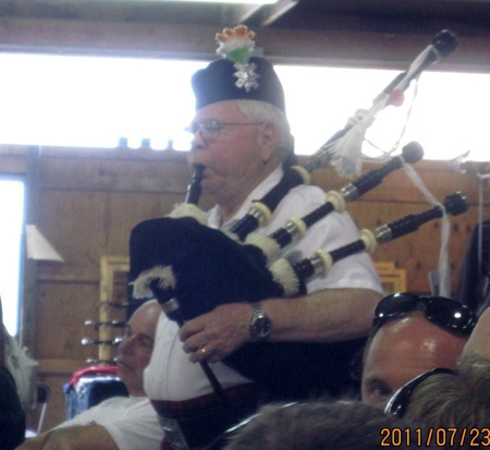 John Carrig, who has been piping in priests for Mass for many years