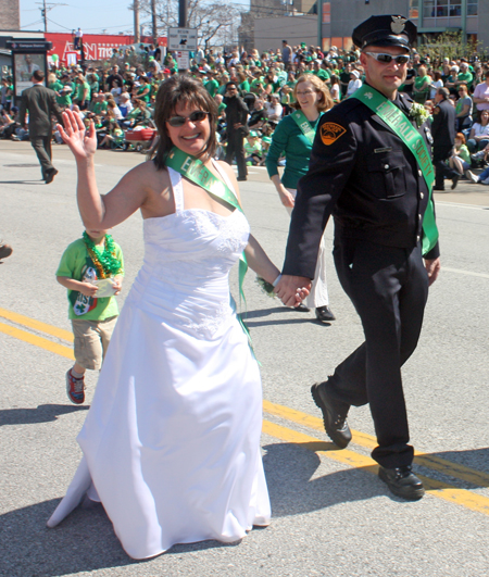 Bride marching with Cleveland Police Department at St. Patrick's Day Parade