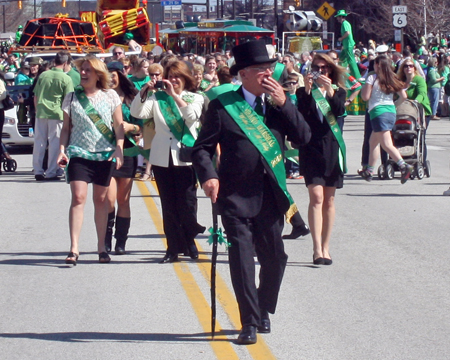 Grand Marshall Mickey McNally marching through the Cleveland Firefighters Memorial Pipes & Drums lines