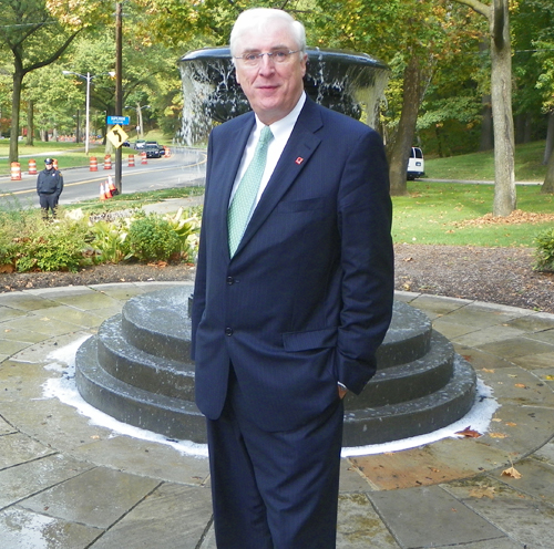 Irish Ambassador to the US Michael Collins in front of the Lennon Fountain