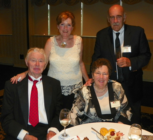 Mary and Robert Masterson (standing) Manus and Bridgie Conway