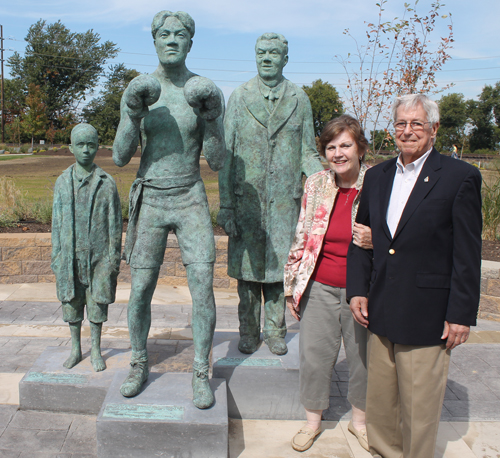 Lee and Jim Brennan with Johnny Kilbane statue