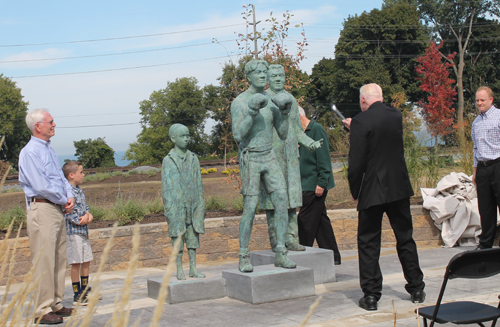 Fr Jim O'Donnell blessing the Johnny Kilbane statue