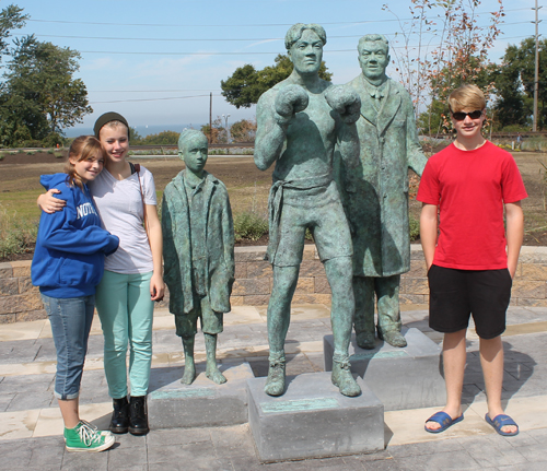 Teens at Johnny Kilbane statue