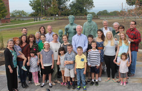 Members of the O'Toole family, descendants of boxer Johnny Kilbane, were the first to pose with the new statue