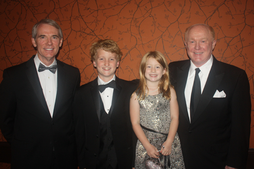 Senator Rob Portman and honoree Ed Crawford with Ed's granddaughter Claire and grandson Colin