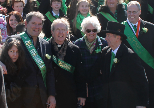 Bernie Kosar with Grand Marshall Andy Dever and family