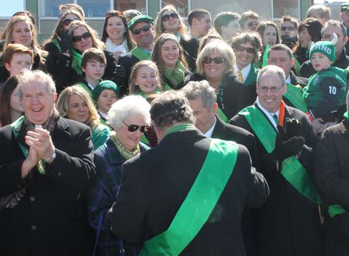 Grand Marshall Andy Dever blows the whistle to start the St Patrick's Day Parade