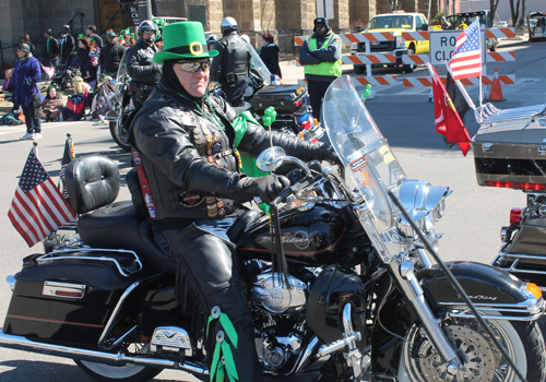 Green motorcycle in parade