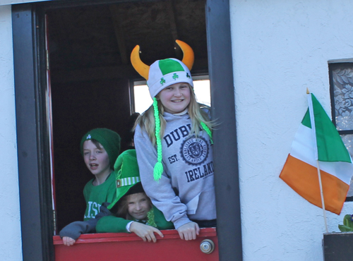 Girl with horns on hat at parade