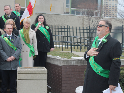 Katie Cooper led the national anthem of Ireland in Irish and of the United States. 