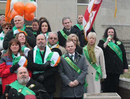 Katie Cooper led the national anthem of Ireland in Irish and of the United States. 