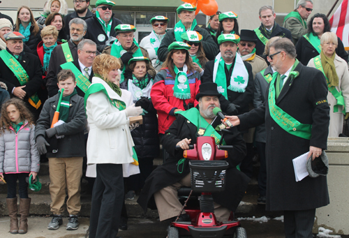 Grand Marshall Roger Weist blows the whistle to start the Parade