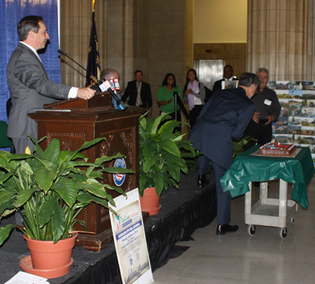 Mayor Jackson blowing out birthday cake candles