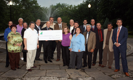 Italian Club presidents presenting a check to the Mayor of Capistrano Italy