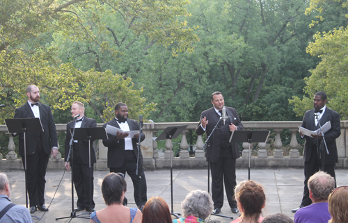 Tenors Mikhail Urusov, Brad Paller and Matthew Jones joined with Baritone James Binion and Bass Baritone Christopher Aldrich to perform Mamma by Cesare Andrea Bixio at the 2015 Opera in the Italian Cultural Garden