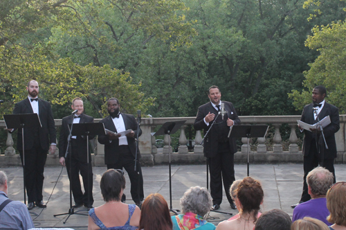 Tenors Mikhail Urusov, Brad Paller and Matthew Jones joined with Baritone James Binion and Bass Baritone Christopher Aldrich to perform Dicitencello Vuie by Rodolfo Falvo at the 2015 Opera in the Italian Cultural Garden