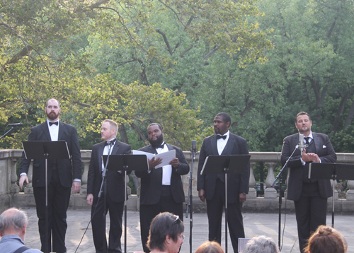 Tenors Mikhail Urusov, Brad Paller and Matthew Jones joined with Baritone James Binion and Bass Baritone Christopher Aldrich to perform Dicitencello Vuie by Rodolfo Falvo at the 2015 Opera in the Italian Cultural Garden