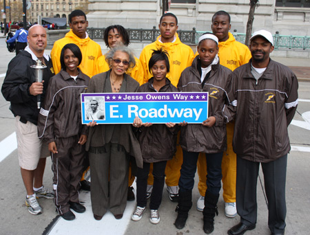 Jesse Owens' daughter Gloria with East Tech track athletes