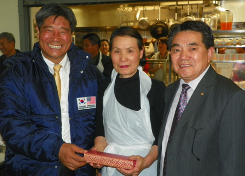Song Pil-Gak, chairman of the Korean province of Gyeongsangbuk-Do with Mrs. and Sam Kim