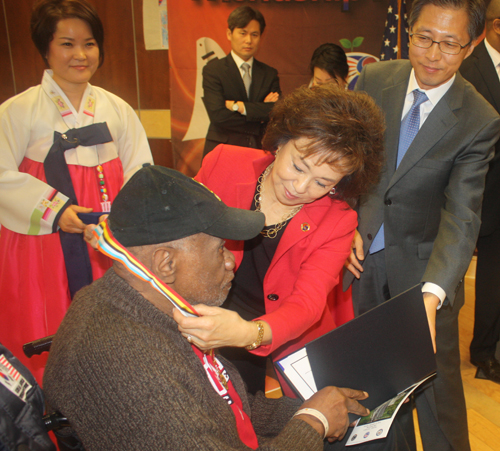 Awarding a Korean war Veteran