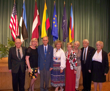 Group at Baltic State service to commemorate the Soviet occupation and  victims of mass deportation