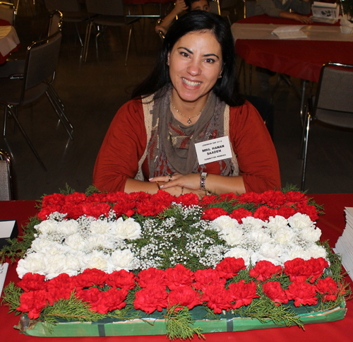 Hanan Saadeh with her Lebanese flag made of flowers