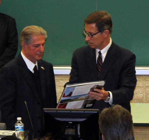 David Fleshler presents President Gemayel with a book